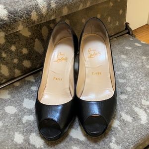 Black Louboutin open toe heels